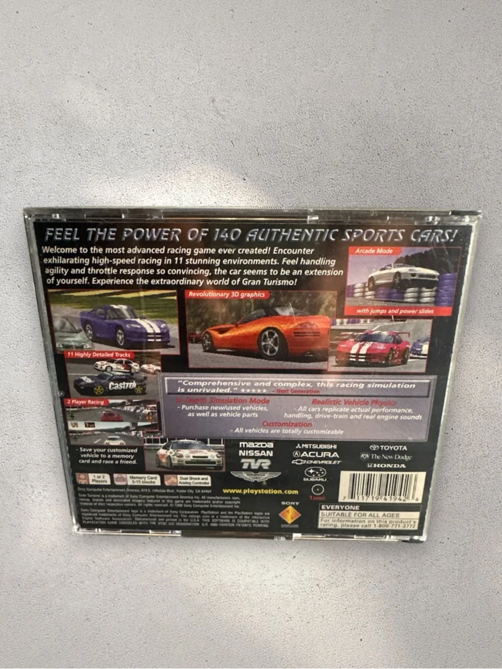 PlayStation Grand Turismo game with case and booklets